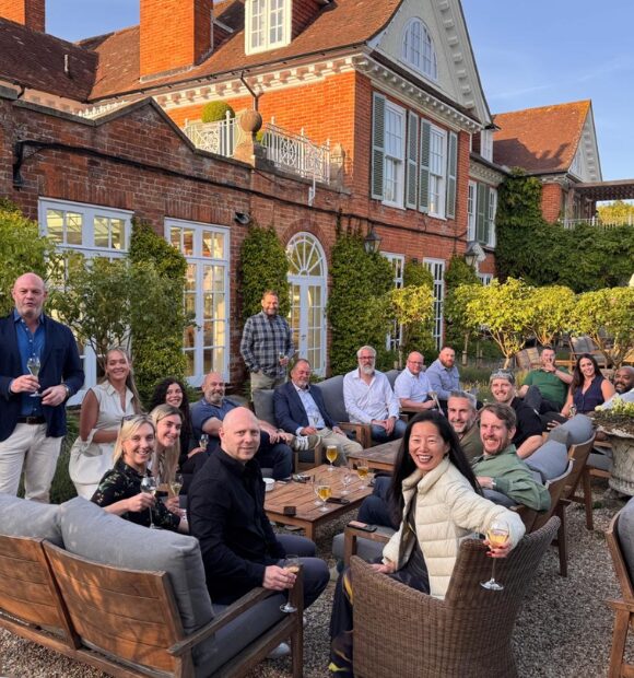 The asembl team sat outside at Chewton Glen
